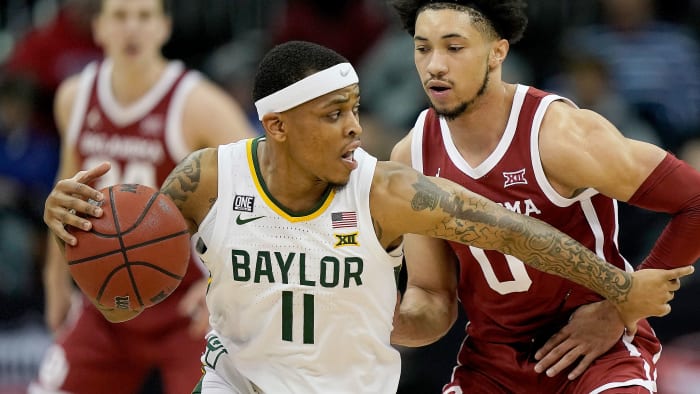 Baylor’s James Akinjo dribbles vs. Oklahoma